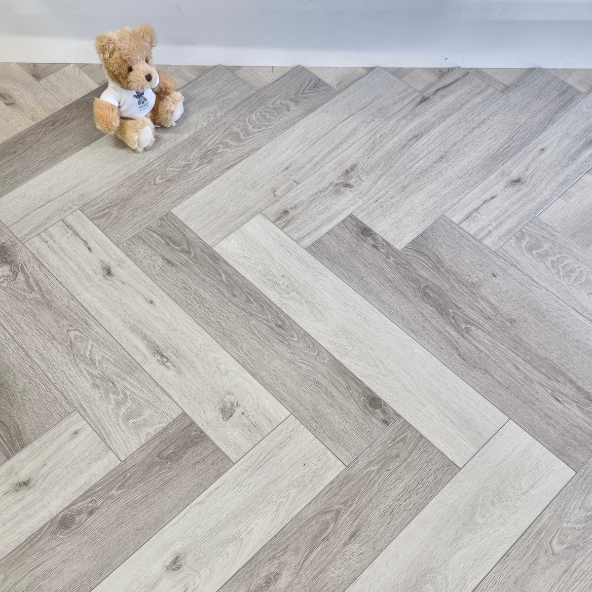 Karna Light Grey Oak Herringbone SPC